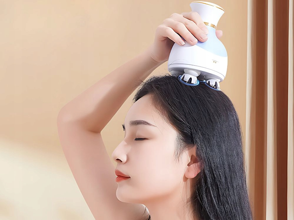 elektrický masážny prístroj na hlavu